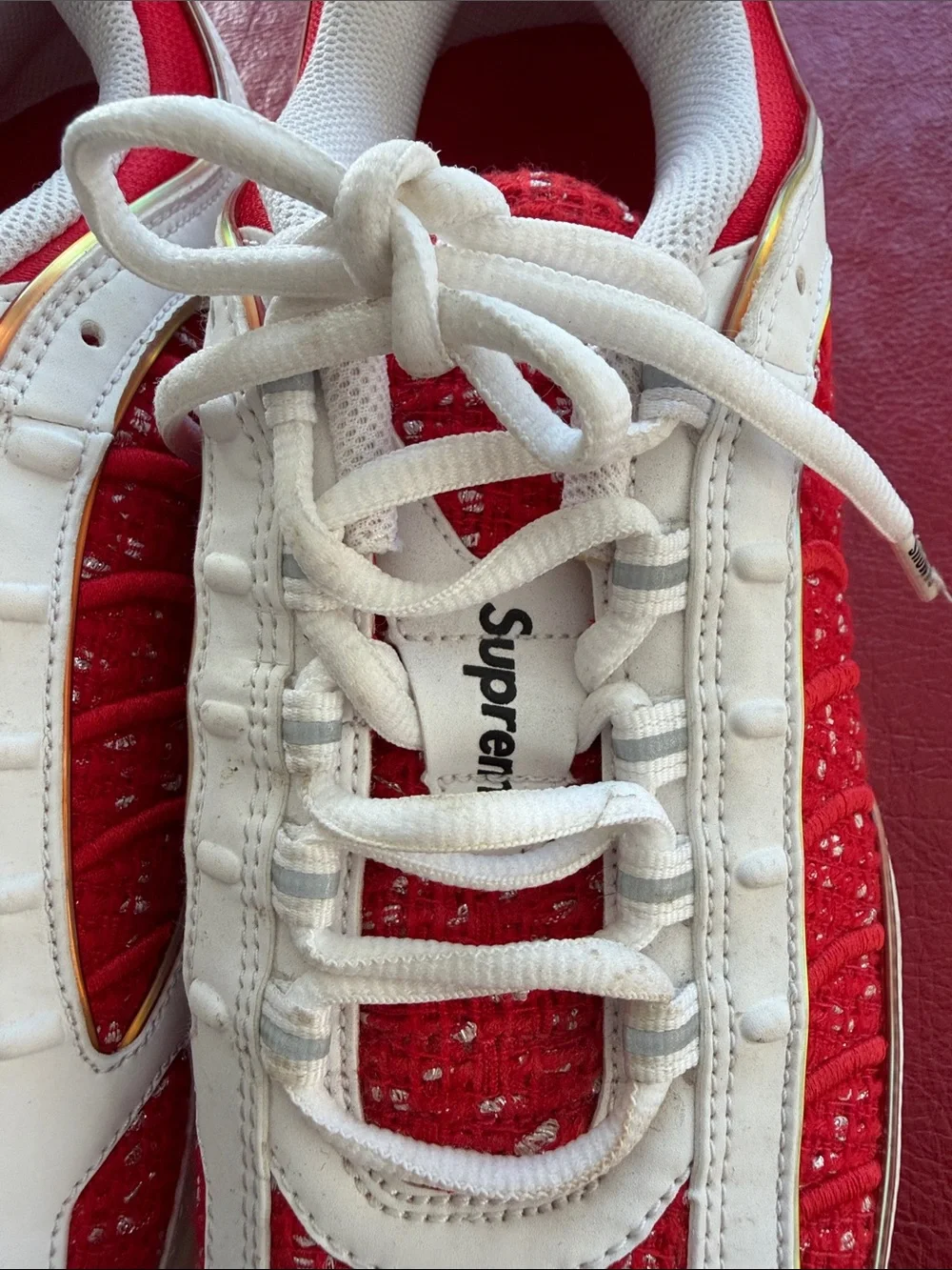 White and Red Nike x Supreme Sneakers